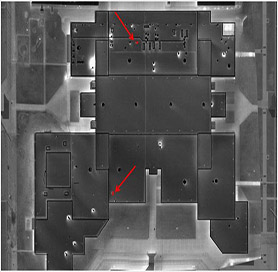 Aerial image of building roof demonstrating prison facility maintenance